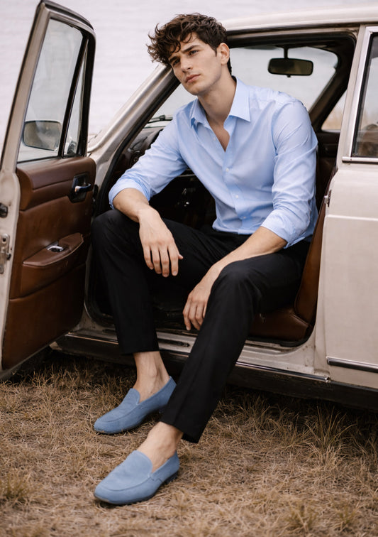 Montx men's sky blue full-sleeve cotton shirt with a classic collar and button-up front, displayed on a hanger.